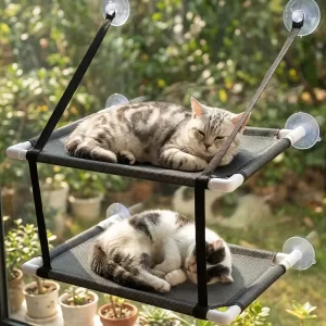 2 gatos acostados en hama para gatos doble nivel